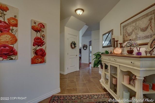 10885 Splendor Loop, Eagle River, AK 99577 - corridor with tile patterned floors and baseboards