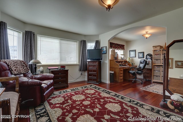 10885 Splendor Loop, Eagle River, AK 99577 - office featuring arched walkways and dark wood-type flooring