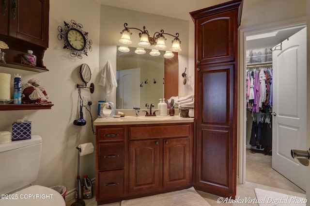 10885 Splendor Loop, Eagle River, AK 99577 - bathroom featuring vanity and toilet