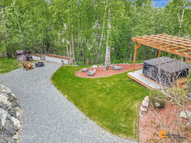 10885 Splendor Loop, Eagle River, AK 99577 - view of green lawn with a pergola and a wooden deck