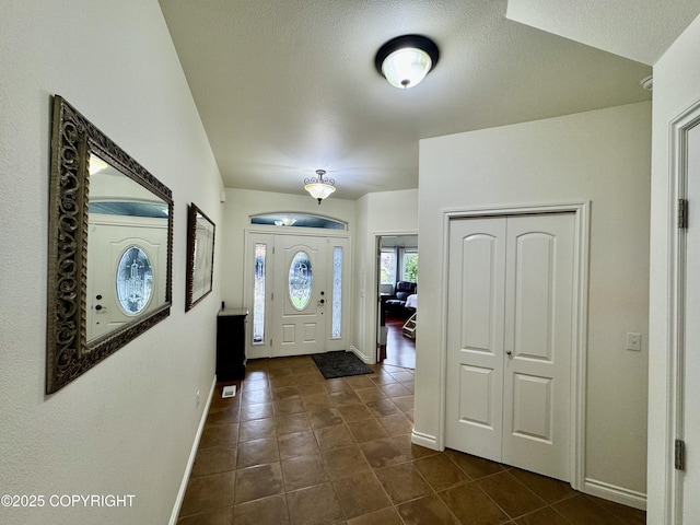 10885 Splendor Loop, Eagle River, AK 99577 - foyer featuring dark tile patterned flooring