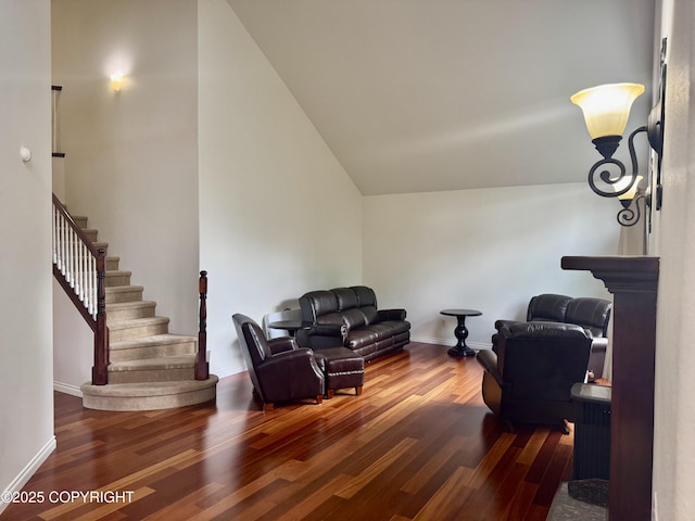 10885 Splendor Loop, Eagle River, AK 99577 - living area with wood finished floors, stairway, and vaulted ceiling