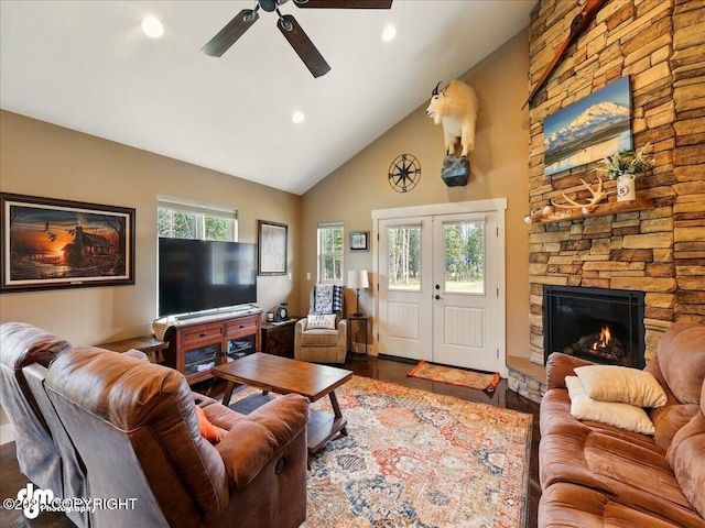 37638 Dutch Landing Loop, Sterling, AK 99672 - living area with a ceiling fan, wood finished floors, high vaulted ceiling, a stone fireplace, and recessed lighting