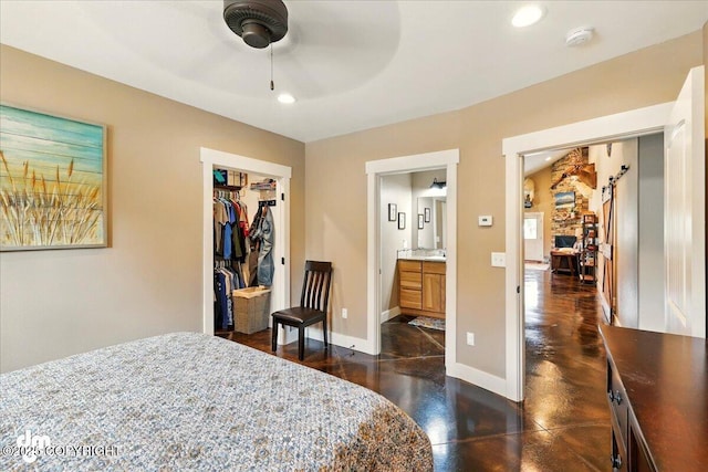 37638 Dutch Landing Loop, Sterling, AK 99672 - bedroom with concrete floors, baseboards, recessed lighting, a closet, and a ceiling fan