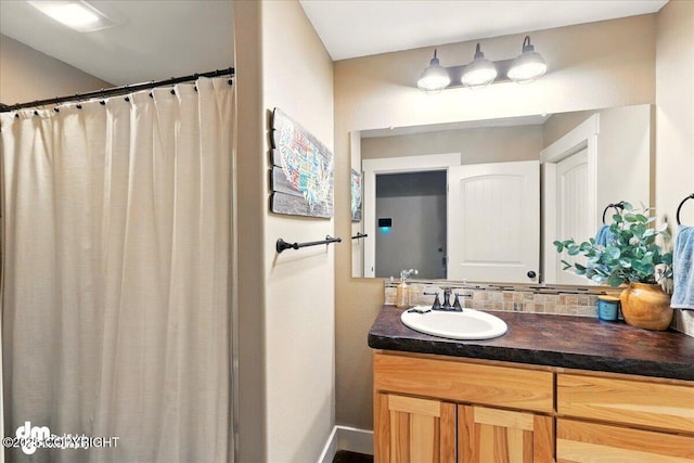 37638 Dutch Landing Loop, Sterling, AK 99672 - full bath featuring vanity, curtained shower, and baseboards