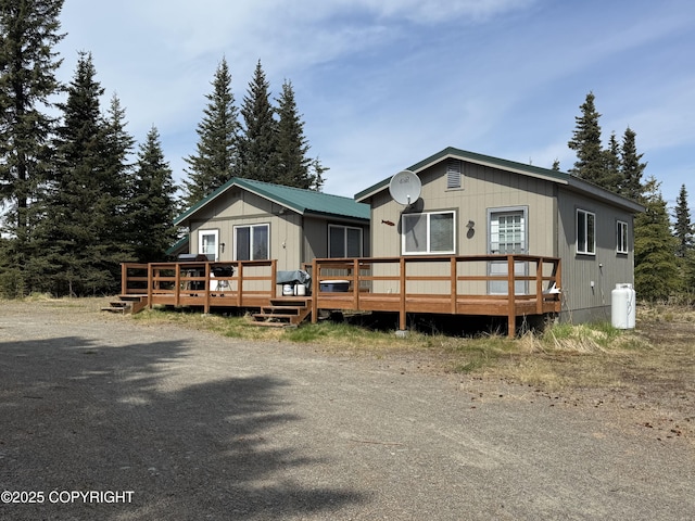 69290 Emily Ct, Ninilchik, AK 99556 - manufactured / mobile home featuring a deck