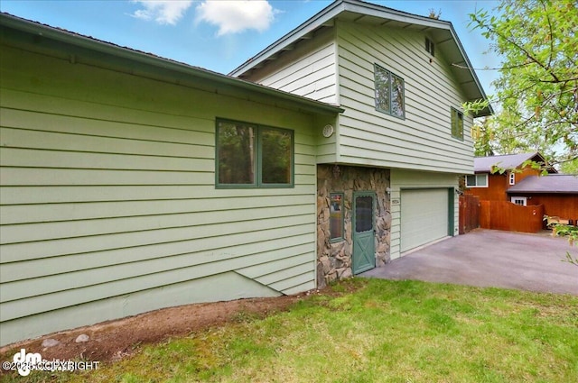 19254 Adak Cir, Eagle River, AK 99577 - view of side of property featuring driveway and an attached garage