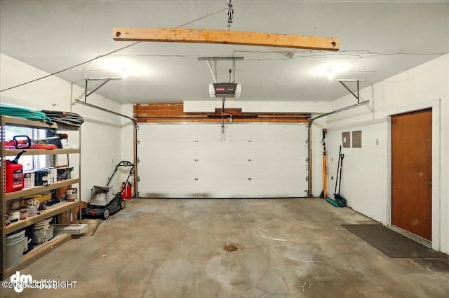 19254 Adak Cir, Eagle River, AK 99577 - garage featuring a garage door opener
