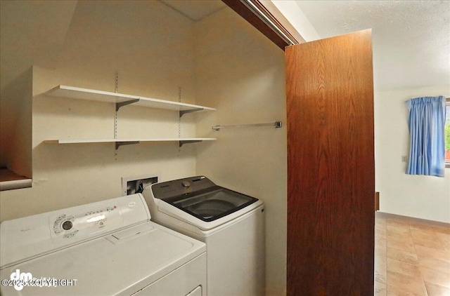 19254 Adak Cir, Eagle River, AK 99577 - laundry room featuring washer and clothes dryer and light tile patterned floors