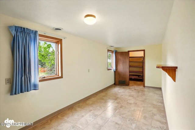 19254 Adak Cir, Eagle River, AK 99577 - unfurnished room featuring baseboards