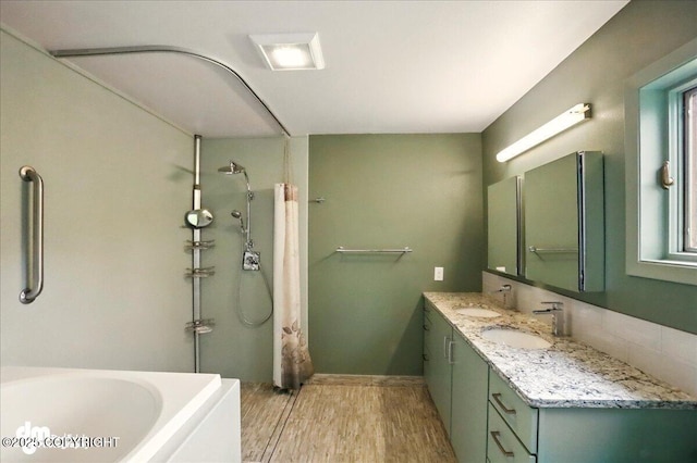 19254 Adak Cir, Eagle River, AK 99577 - bathroom with curtained shower, wood finished floors, a bathtub, and double vanity