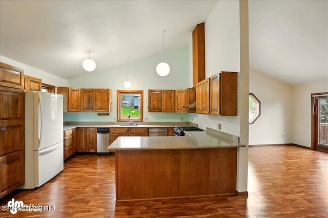 19254 Adak Cir, Eagle River, AK 99577 - kitchen featuring freestanding refrigerator, brown cabinetry, high vaulted ceiling, range with gas stovetop, and stainless steel dishwasher