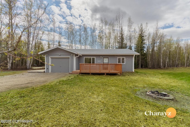 1147 Choctaw Rd, North Pole, AK 99705 - ranch-style home with an attached garage, dirt driveway, a front lawn, and a wooden deck