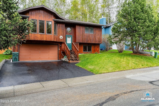 18113 Misty Falls Cir, Eagle River, AK 99577 - raised ranch featuring driveway, a front yard, an attached garage, and a chimney