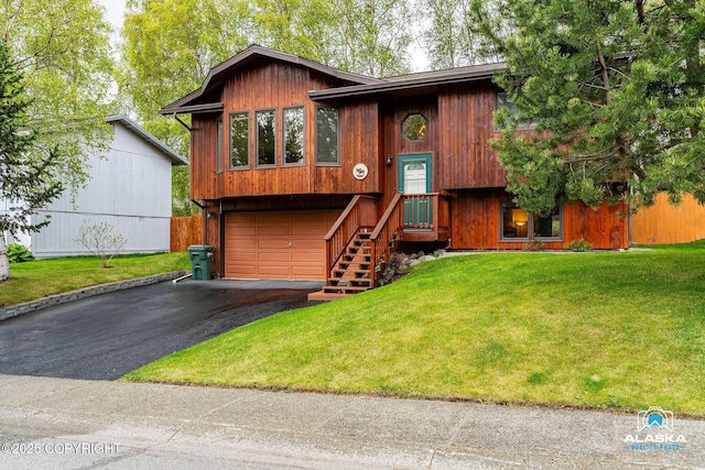 18113 Misty Falls Cir, Eagle River, AK 99577 - rustic home with asphalt driveway, a front lawn, and a garage