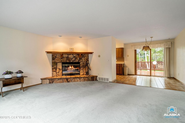 18113 Misty Falls Cir, Eagle River, AK 99577 - unfurnished living room with carpet floors, a fireplace, and baseboards