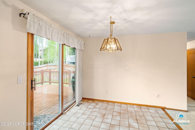 18113 Misty Falls Cir, Eagle River, AK 99577 - unfurnished dining area featuring a chandelier and baseboards