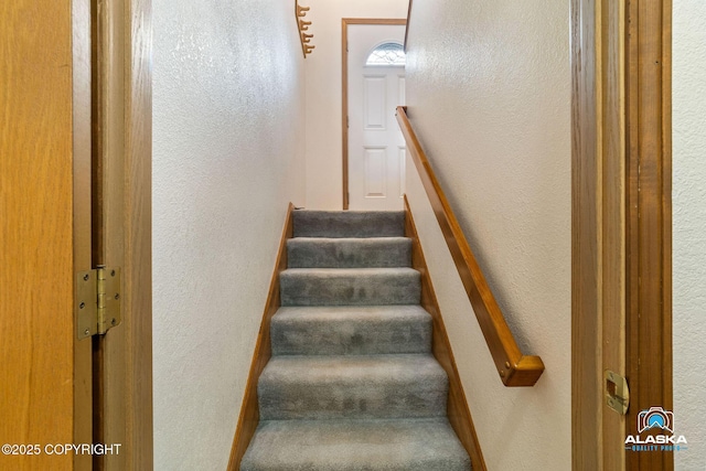 18113 Misty Falls Cir, Eagle River, AK 99577 - staircase featuring a textured wall
