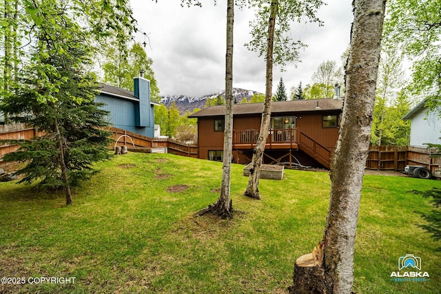 18113 Misty Falls Cir, Eagle River, AK 99577 - back of property featuring a wooden deck and stairway