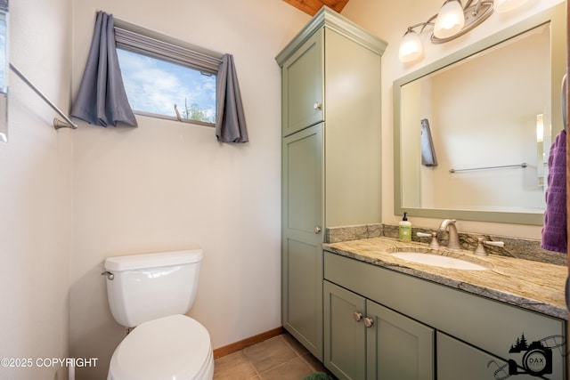 18365 E Twin Hills Ln, Sutton, AK 99645 - half bath featuring toilet, vanity, tile patterned floors, and baseboards