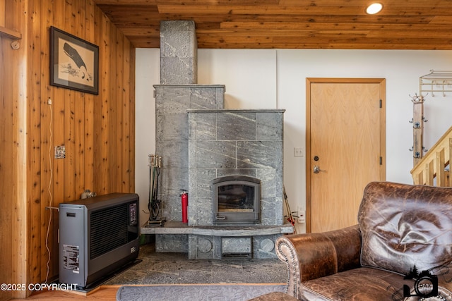18365 E Twin Hills Ln, Sutton, AK 99645 - living area with wood ceiling, a glass covered fireplace, and heating unit