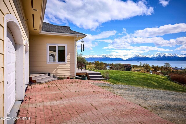 41293 Crested Crane St, Homer, AK 99603 - view of patio with a deck with water view