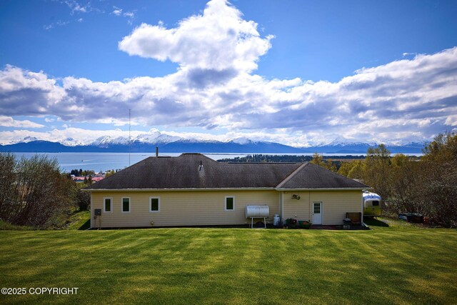 41293 Crested Crane St, Homer, AK 99603 - back of house with a lawn, oil tank, and a water and mountain view