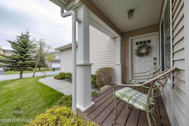2823 Discovery Bay Dr, Anchorage, AK 99515 - wooden terrace featuring a yard and covered porch