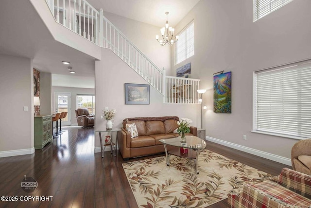 2823 Discovery Bay Dr, Anchorage, AK 99515 - living area with baseboards, a high ceiling, plenty of natural light, and wood finished floors