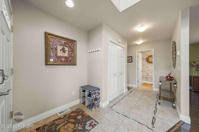 2823 Discovery Bay Dr, Anchorage, AK 99515 - foyer with baseboards and light tile patterned flooring