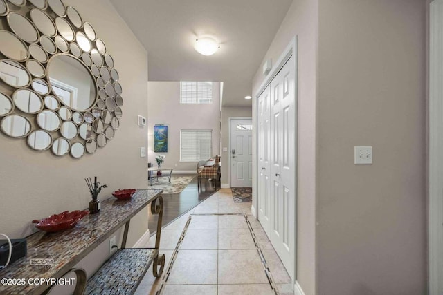 2823 Discovery Bay Dr, Anchorage, AK 99515 - corridor with baseboards and light tile patterned floors