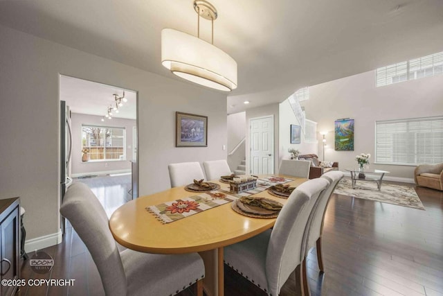 2823 Discovery Bay Dr, Anchorage, AK 99515 - dining area with stairway, baseboards, and dark wood-style floors