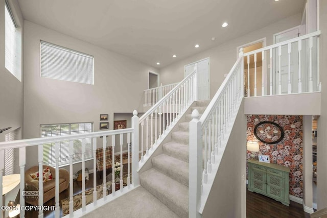 2823 Discovery Bay Dr, Anchorage, AK 99515 - stairway with recessed lighting and wood finished floors