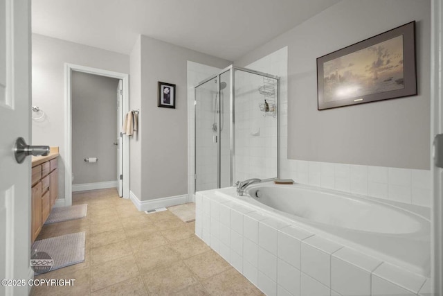 2823 Discovery Bay Dr, Anchorage, AK 99515 - full bath with a stall shower, a bath, vanity, and baseboards