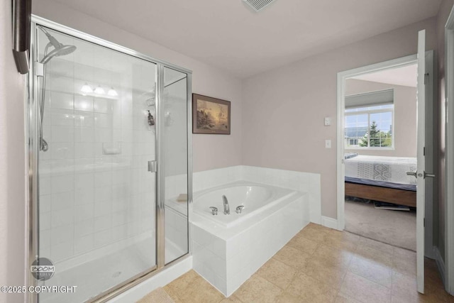 2823 Discovery Bay Dr, Anchorage, AK 99515 - ensuite bathroom featuring a shower stall, a bath, and tile patterned floors