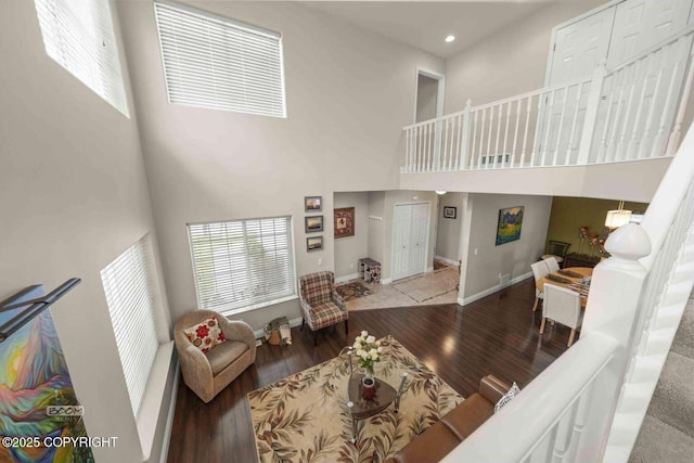 2823 Discovery Bay Dr, Anchorage, AK 99515 - living area with a high ceiling, wood finished floors, baseboards, and recessed lighting