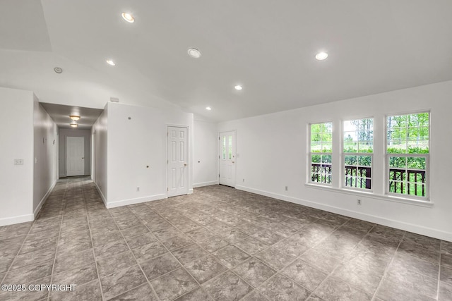 1151 W Gail Dr, Wasilla, AK 99654 - spare room with vaulted ceiling, baseboards, and recessed lighting