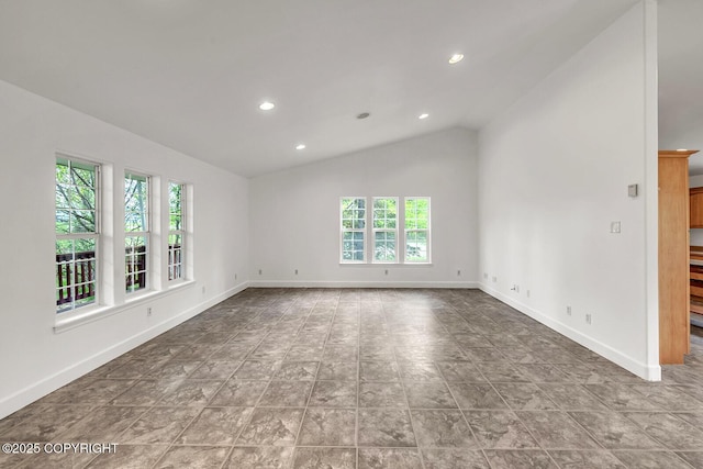 1151 W Gail Dr, Wasilla, AK 99654 - empty room with vaulted ceiling, baseboards, and recessed lighting