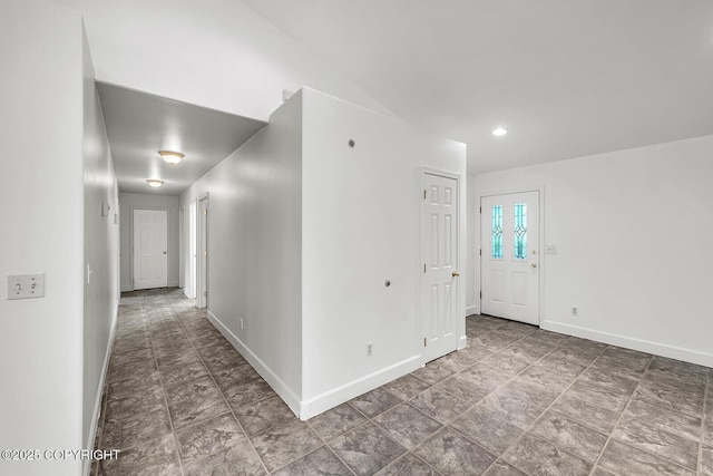 1151 W Gail Dr, Wasilla, AK 99654 - unfurnished room with baseboards and stone finish floors