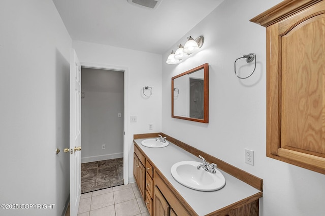 1151 W Gail Dr, Wasilla, AK 99654 - bathroom with double vanity, baseboards, and tile patterned flooring