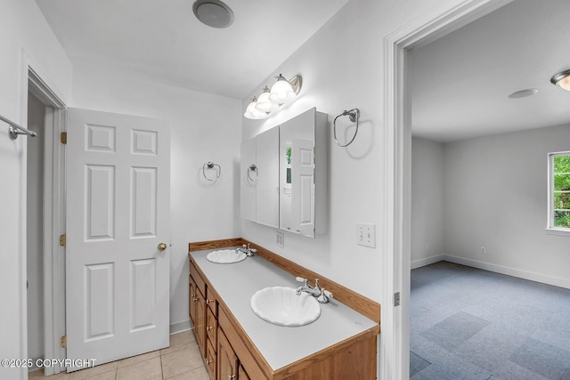 1151 W Gail Dr, Wasilla, AK 99654 - bathroom with baseboards and double vanity
