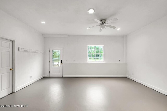 1151 W Gail Dr, Wasilla, AK 99654 - empty room featuring recessed lighting, a ceiling fan, finished concrete floors, and baseboards
