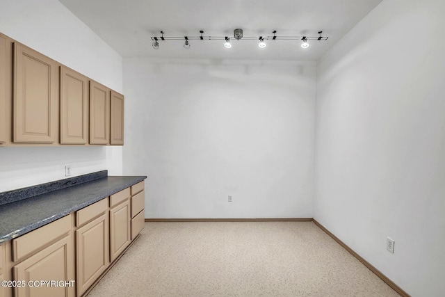 1151 W Gail Dr, Wasilla, AK 99654 - kitchen featuring dark countertops and baseboards