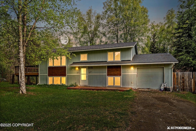 1031 E Dunedin St, Wasilla, AK 99654 - view of front of house with driveway, an attached garage, and roof with shingles