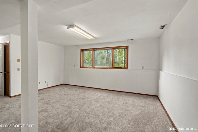 1031 E Dunedin St, Wasilla, AK 99654 - unfurnished room with light colored carpet and baseboards