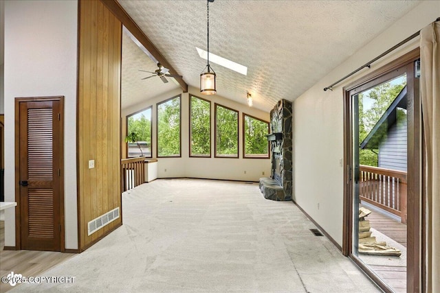 2921 Rocky Bay Cir, Anchorage, AK 99515 - unfurnished sunroom featuring a skylight