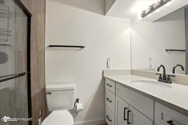2921 Rocky Bay Cir, Anchorage, AK 99515 - full bath with vanity, a shower with door, toilet, and baseboards