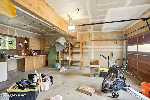 2921 Rocky Bay Cir, Anchorage, AK 99515 - garage featuring a garage door opener