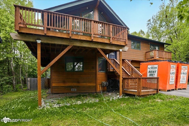 2921 Rocky Bay Cir, Anchorage, AK 99515 - rear view of property with a wooden deck