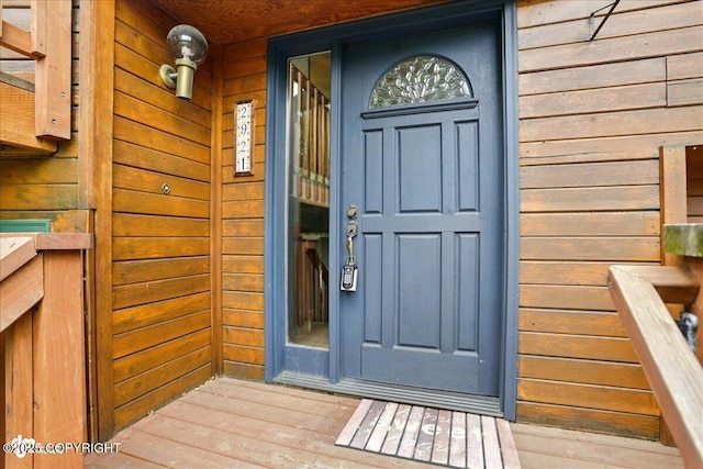 2921 Rocky Bay Cir, Anchorage, AK 99515 - entrance to property featuring covered porch